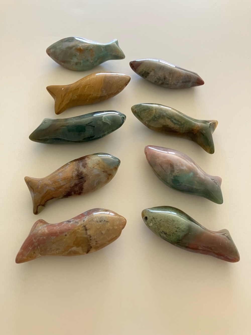 Nine 2 1/2” Long Carved Fish